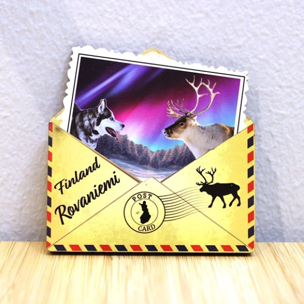 Giftis puumagneetti revontuli husky ja poro kuoressa